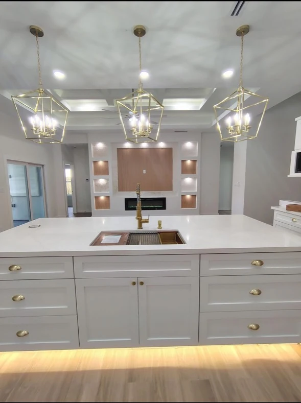 Kitchen island and interior area with light finishes.